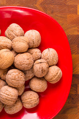 walnuts in red plate