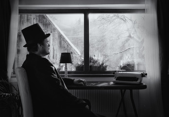 Vintage Book Writer is Looking out of Window