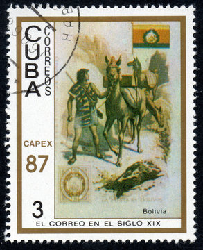 UKRAINE - CIRCA 2017: A stamp printed in Cuba, shows a man leading a horse Bolivia, the series The mail in the nineteenth century, circa 1987