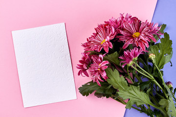 Flowers and paper sheet. Send loving thoughts.