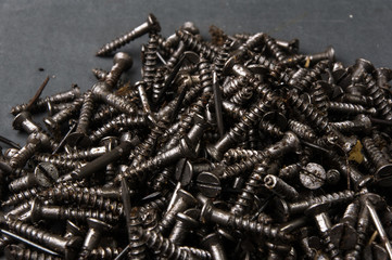 black oiled Bunch of screws