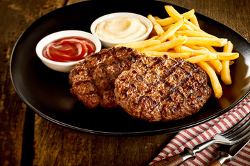 Minced meat stakes and french-fries