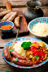 Couscous and Merguez Sausages.selective focus