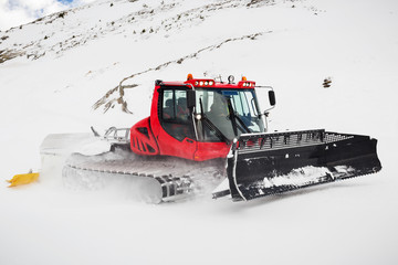 Snow Groomer on a Piste