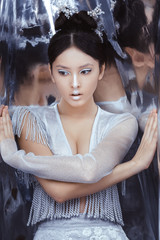 Shot of a futuristic young asian woman.