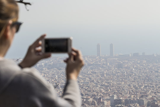 Woman making photos in Barcelona