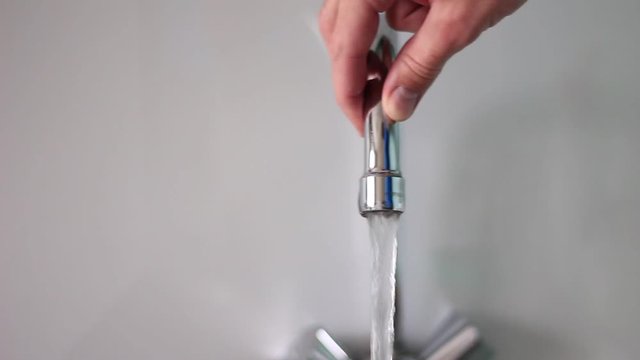 Turning a water tap  from left to right