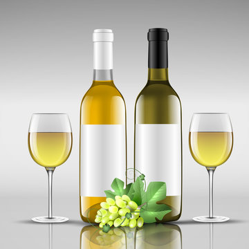 bottles of white wine with glass