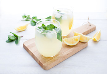 Obraz na płótnie Canvas Lemonade with cucumber, lemon and mint. Detox drink