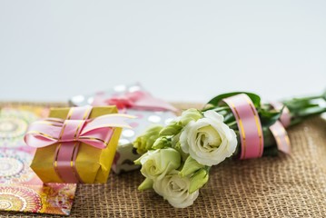 On a holiday or a celebration Your beloved woman or girl a nice place with a sincere congratulations beautiful flowers and a cute original gift. © Александр Орлов