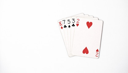 Poker hand ranking, symbol set Playing cards in casino: hight hand, King, seven, five, three, two on white background, luck abstract, horizontal copyspace