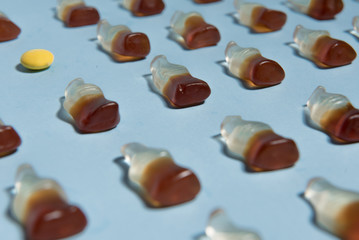 Sweeties chewing candy in bottle form