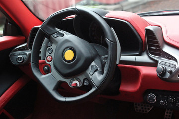 Fototapeta na wymiar Car interior luxury service. Car interior details. View of the interior of a modern automobile showing the dashboard