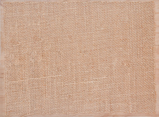 Linen fabric texture grunge on wooden board