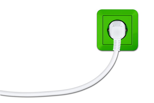 green electric socket with white cable and connector concept isolated on white background / Steckdose mit Stecker und Kabel grün Ökostrom Konzept isoliert