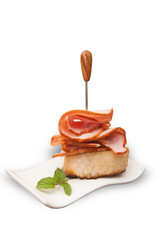Smoked meat slices - mini ham sandwich on white background