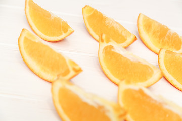Naklejka na ściany i meble pieces of sliced orange