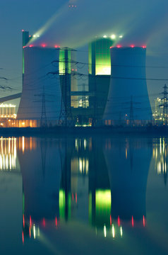 Coal Power Plant reflecting in Lake at Night