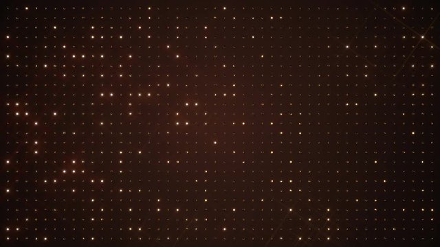 Rotating glittering golden coins on dark background.  All that glitters is gold. Perfect loop.