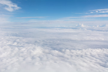 Clouds in the sky seen from an airplane above 