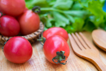 closeup red tomatoes on wooden background