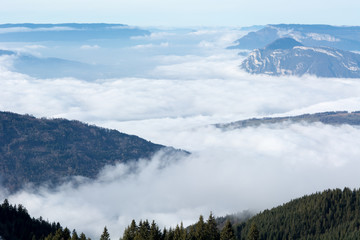 Aerial photo cloudy valley in the alps 