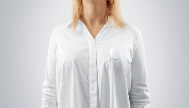 Blank Button Badge Mockup Pinned On The Womans Chest. Girl Wear White Shirt And Campaign Pin Mock Up. Volunteer Round Emblem Design Element. Pesron Stand Front View With Canvass Voting Symbol Template