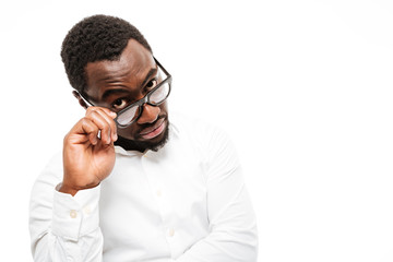 Handsome young african man dressed in shirt wearing glasses