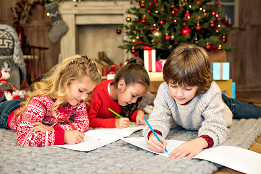 Happy kids drawing picture