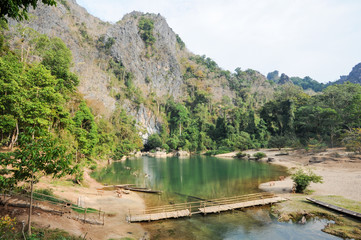 Fototapeta na wymiar The entrance of karst limestone Tham Kong Lo cave