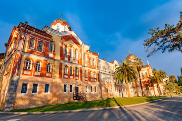Fototapeta premium New Athos monastery of St. Simon the Canaanite monastery in the sunshine. New Athos, Abkhazia.