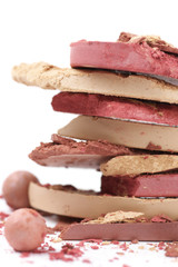 Stack of various crashed makeup products