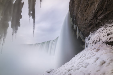 Behind Niagara Falls in winter 