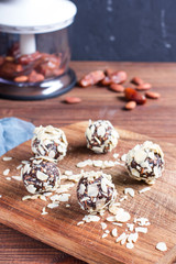 Sweets of dried fruits and nuts, handmade, vertical, selective focus