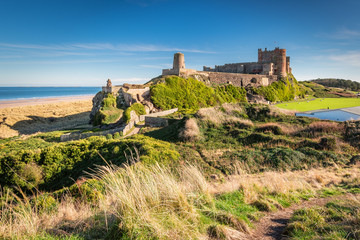 Elevated View of Bamburgh Castle / Bamburgh Castle viewed from an elevated hillock, on the...