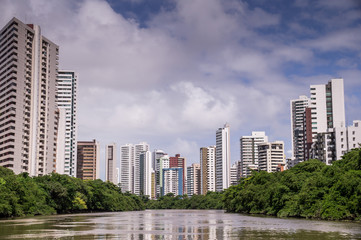 Fototapeta premium The skyline of Recife in Pernambuco, Brazil seen from river