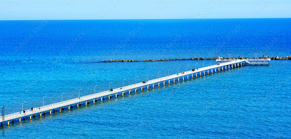 Wall mural Walking over the sea