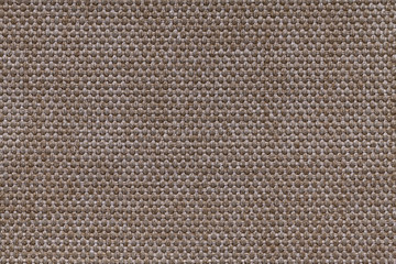 Brown textile background with checkered pattern, closeup. Structure of the fabric macro.