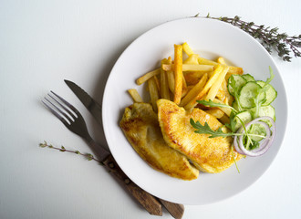 Turkey steak on a wooden Board. on white background