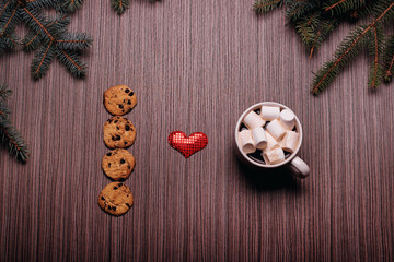 Ceramic Mug coffee, chocolate cookies, dark board