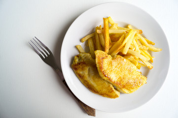 Turkey steak on a wooden Board. on white background