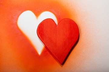 Holidays gift and heart on a white background.