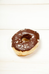 Doughnuts on a white wooden table