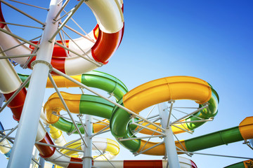 Water park with water colored flights and pools.