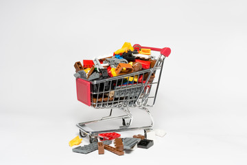 shopping cart with colored construction blocks