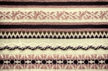 Patterns and convex decorative  details on knitted surface
