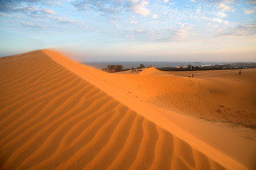Fototapeta na wymiar Red sand dune at Mui Ne city, Vietnam.