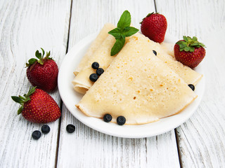 crepes with strawberries and blueberries