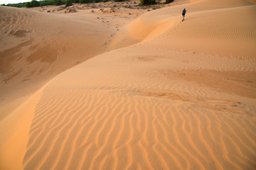 Fototapeta na wymiar Red sand dune at Mui Ne city, Vietnam.