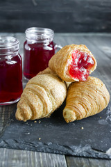 Fresh croissants with fruit tea